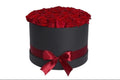Box of Red Roses in Black Round Box