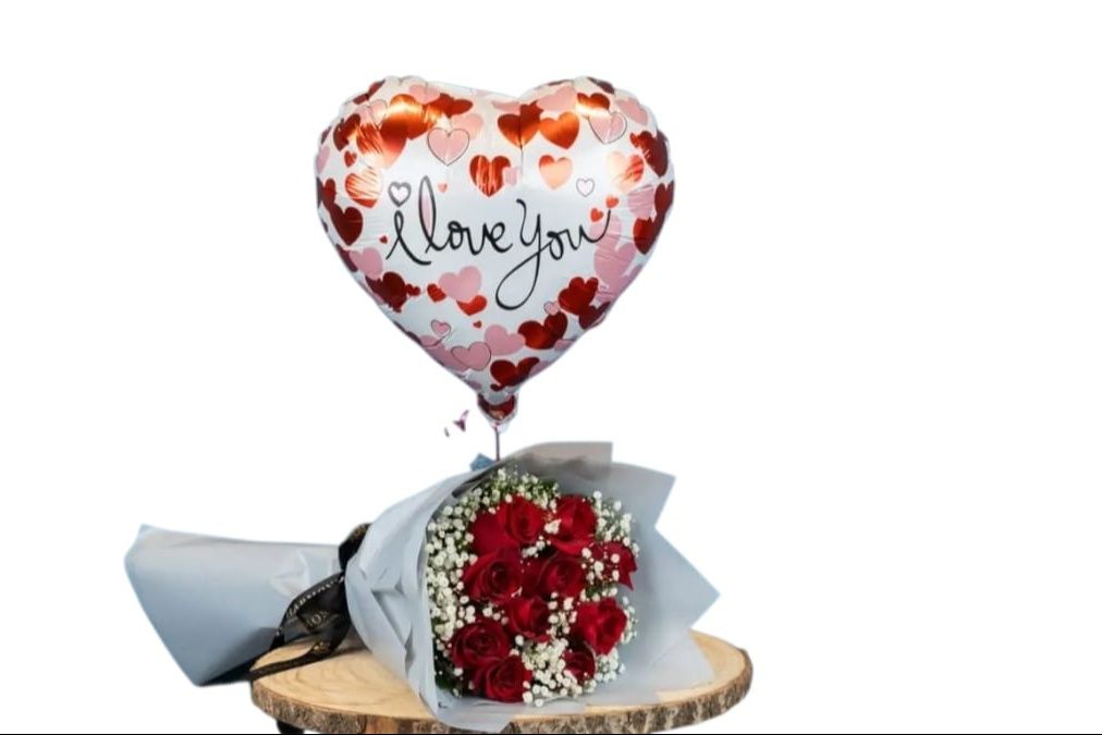 Love of the Night bouquet of 10 red roses with I love you balloons.