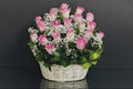 Light pink basket of 21 roses