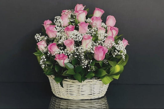 Light pink basket of 21 roses