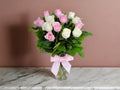 White Vase With Pink Roses