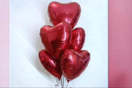 Red hearts balloons