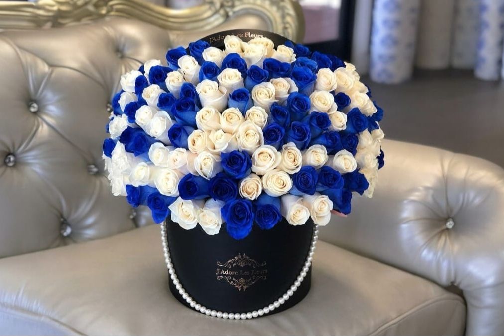 Blue and white rose arrangement
