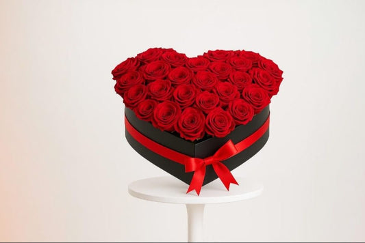 A Heart Shaped Red Rose Box Containing 41 Pieces